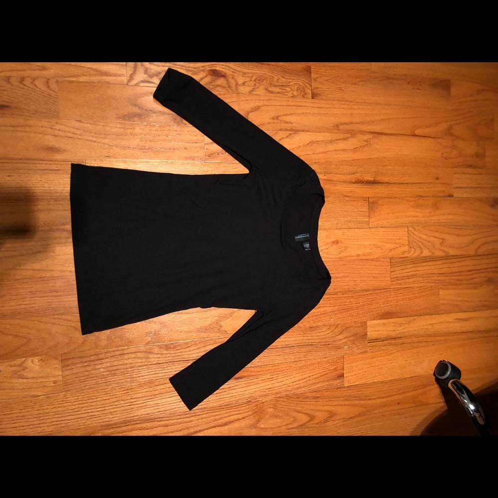 Three quarter sleeve black shirt.
